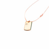 18 Karat Amber Hue Gold Baby Dog Tag with Solitaire Diamond - Chris Aire Fine Jewelry & Timepieces