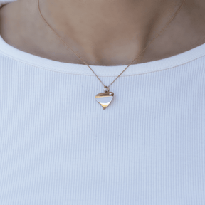 Peaceful Heart - 18 karat amber hue gold necklace